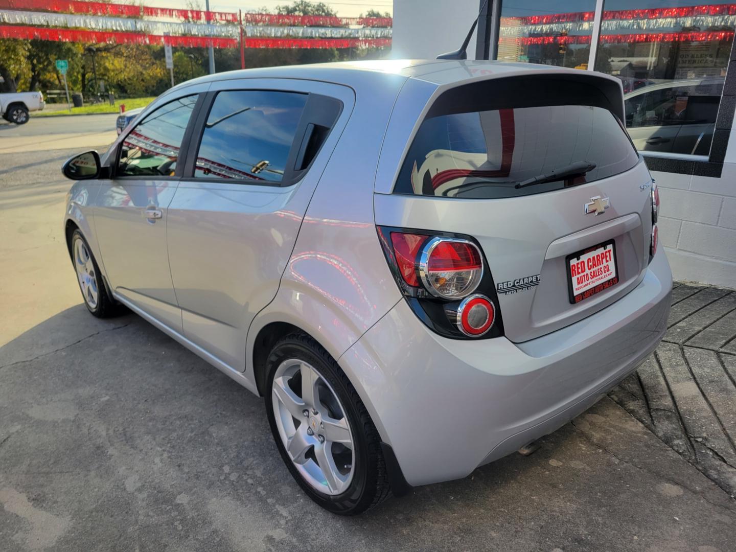 2014 SILVER Chevrolet Sonic (1G1JB6SH6E4) with an 1.8L I4 F DOHC 16V engine, Manual Transmission transmission, located at 503 West Court, Seguin, TX, 78155, (830) 379-3373, 29.568621, -97.969803 - Photo#3